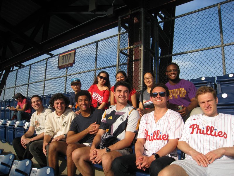 Maximilian Gebauer and colleagues from the Wharton sports analytics summer lab seated together at a Philadelphia Phillies game.